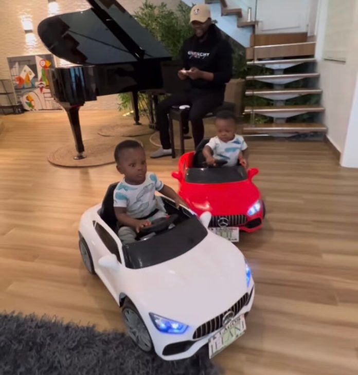Skit-Maker Taaooma Gifts Kizz Daniel’s Sons’ Cars For Their First Birthday