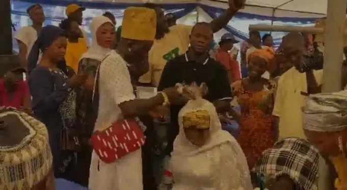 Portable Makes Naira Rain As He Weds His Baby Mama during Their Child Naming Ceremony [Video]
