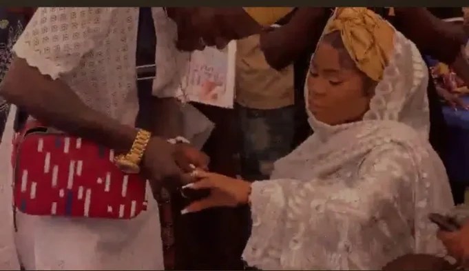Portable Makes Naira Rain As He Weds His Baby Mama during Their Child Naming Ceremony [Video]