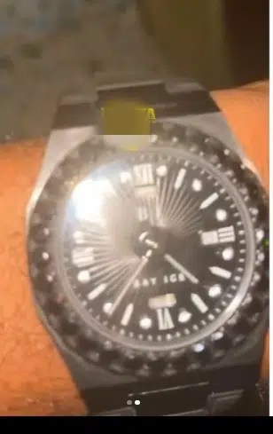 Olamide gifts his N2.4 million wristwatch to a fan who sang his song word for word on stage