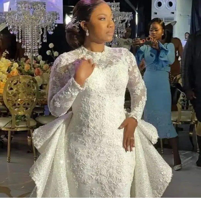 Mercy Chinwo rolls out stunning white wedding photos [Photos & Video]