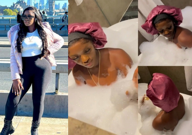 Omo your photographer is careful not to be seen, he deserves an award-  Luchy Donalds stirs reactions as she share Bathtub video